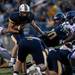 Saline sophomore running back Kevin Gross attempts to gain yards against Pioneer defense on Friday. Pioneer won 7-6. Daniel Brenner I AnnArbor.com